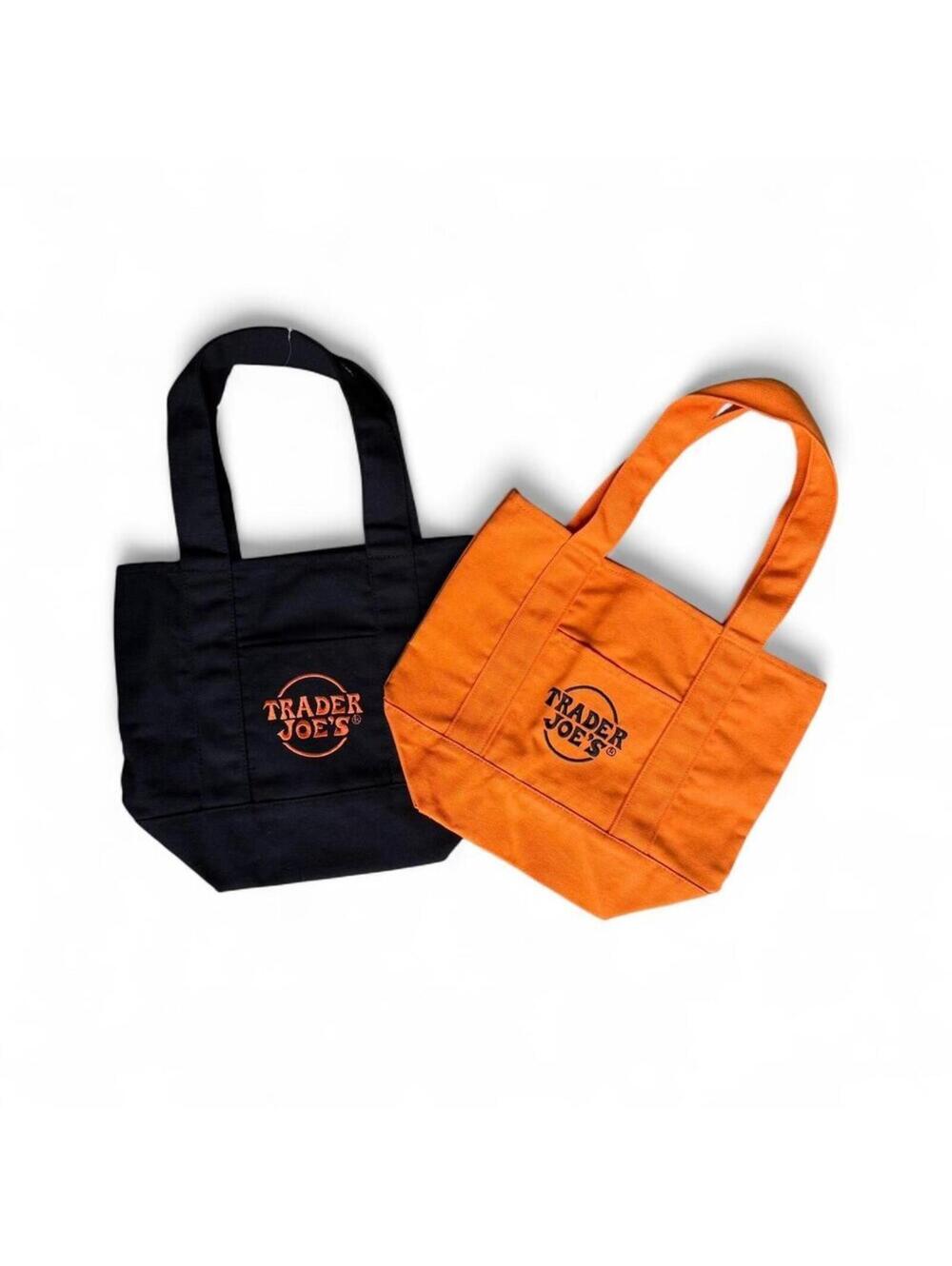 Trader Joe's orange and black reusable tote bags
